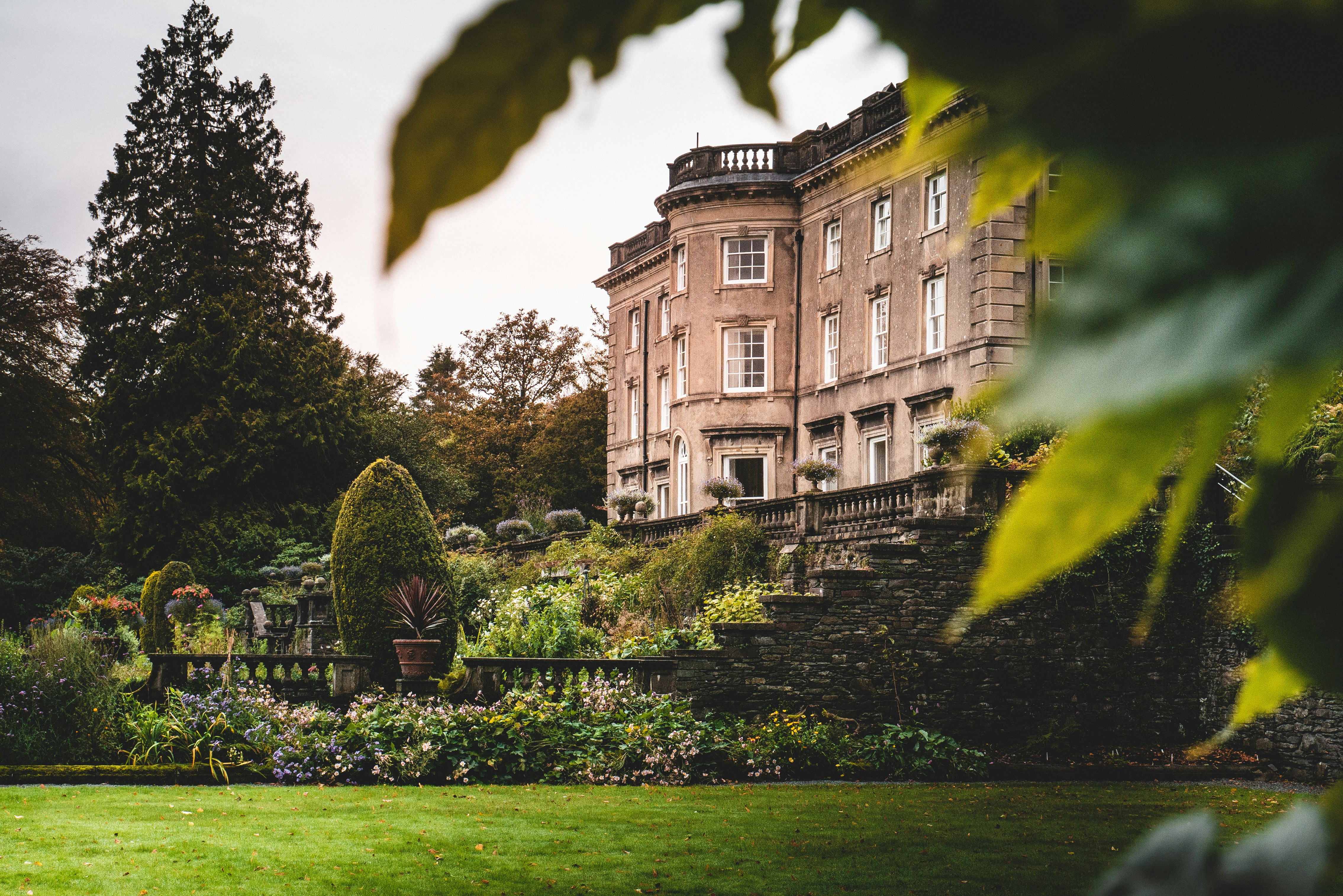 Photograph of an old hall from its grounds